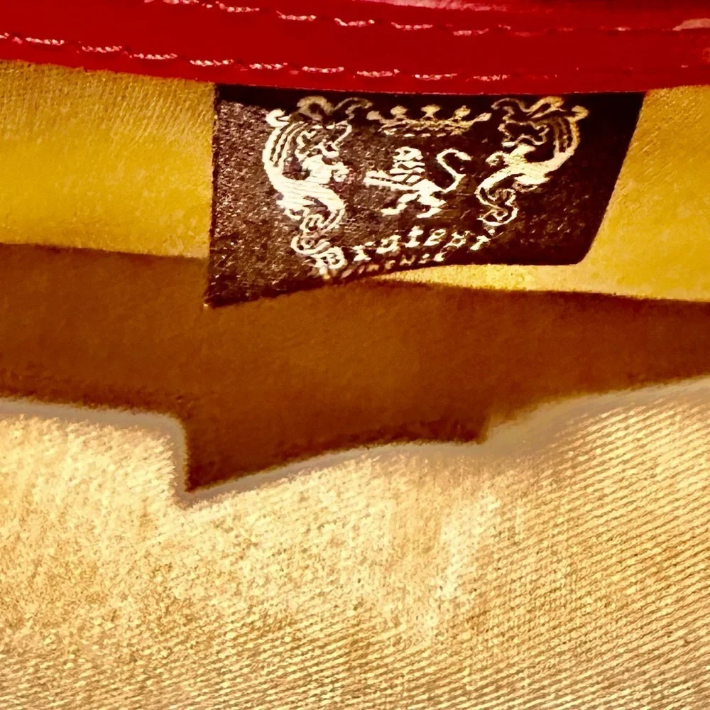 ITALIAN LUX BAG PURCHASED THERE. FAMOUS LION LOGO, DUST BAG PRATESI BRAND